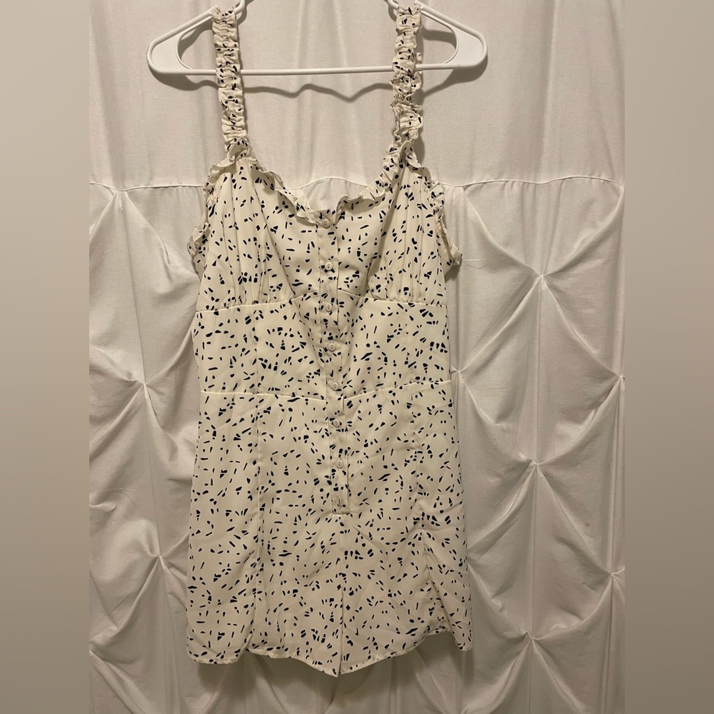 Cute Romper I can’t fit anymore! Like new.